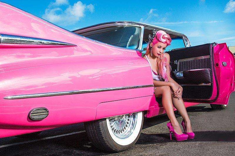 Pin up girl with 1959 cadillac
