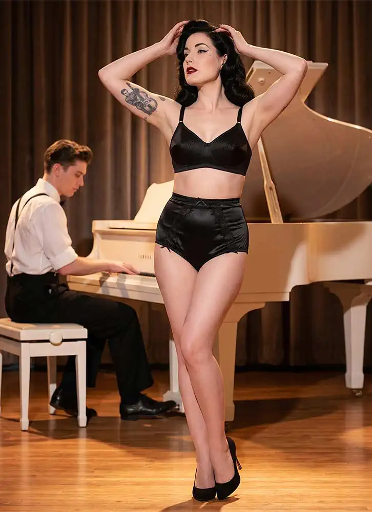 black high waist satin panties worn with a black spiral stitch bra