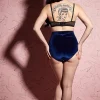 back view showing full bottom coverage and high waist. blue velvet set